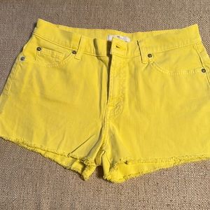 7 for all Mankind yellow denim cutoff shorts EUC size 28